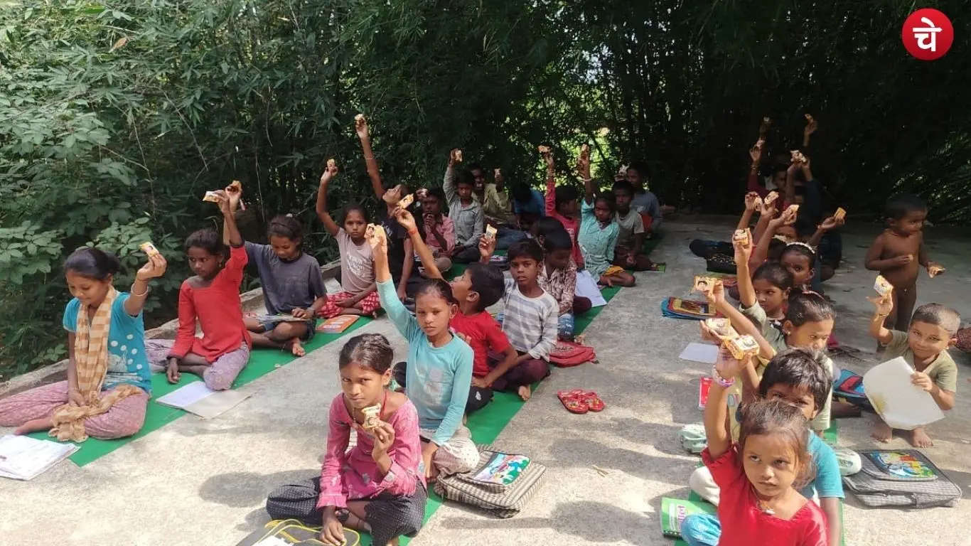 Children studying in the courtyard of a Goddess Durga shrine in Bode ka Purwa, Banda